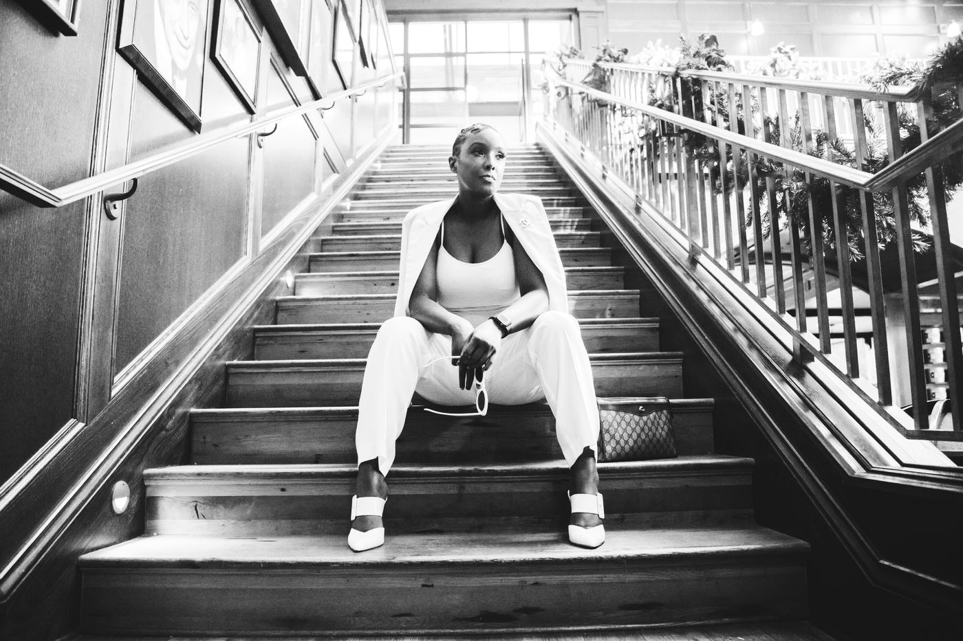 Personal branding portrait on a wooden staircase