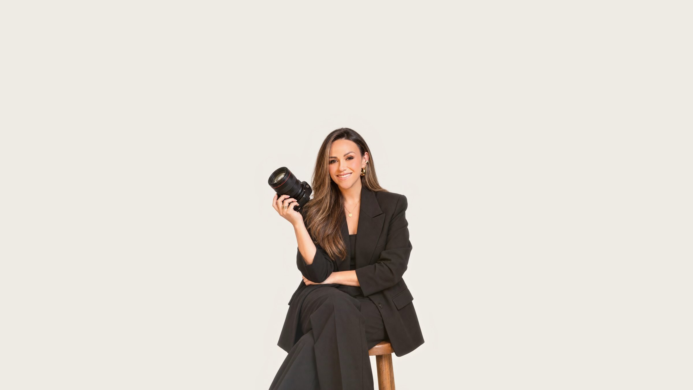 Stephanie Ortiz, founder of Align, seated with her camera
