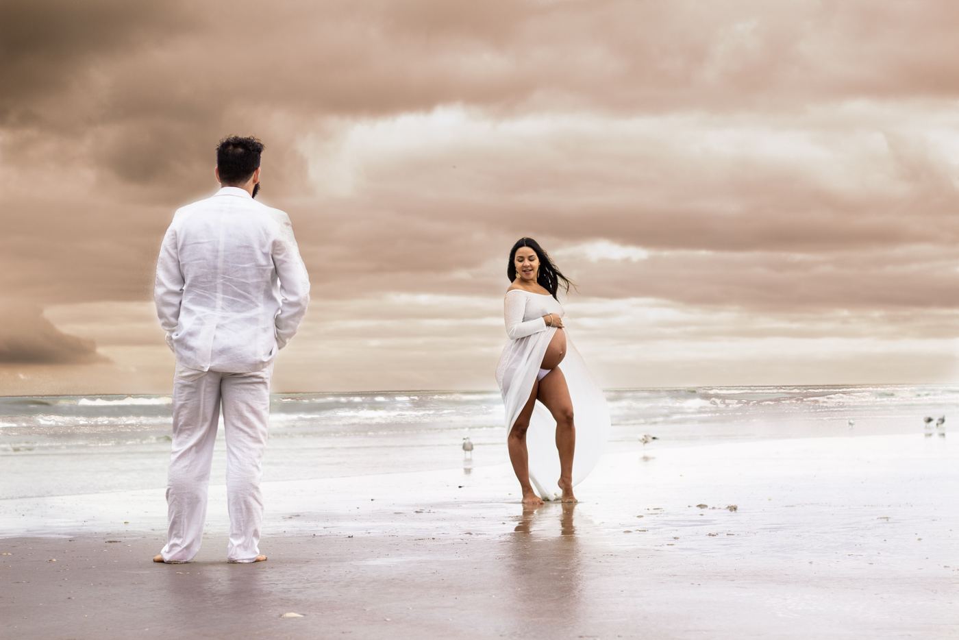 Beach maternity: Soft light and open sky on the Florida coast.