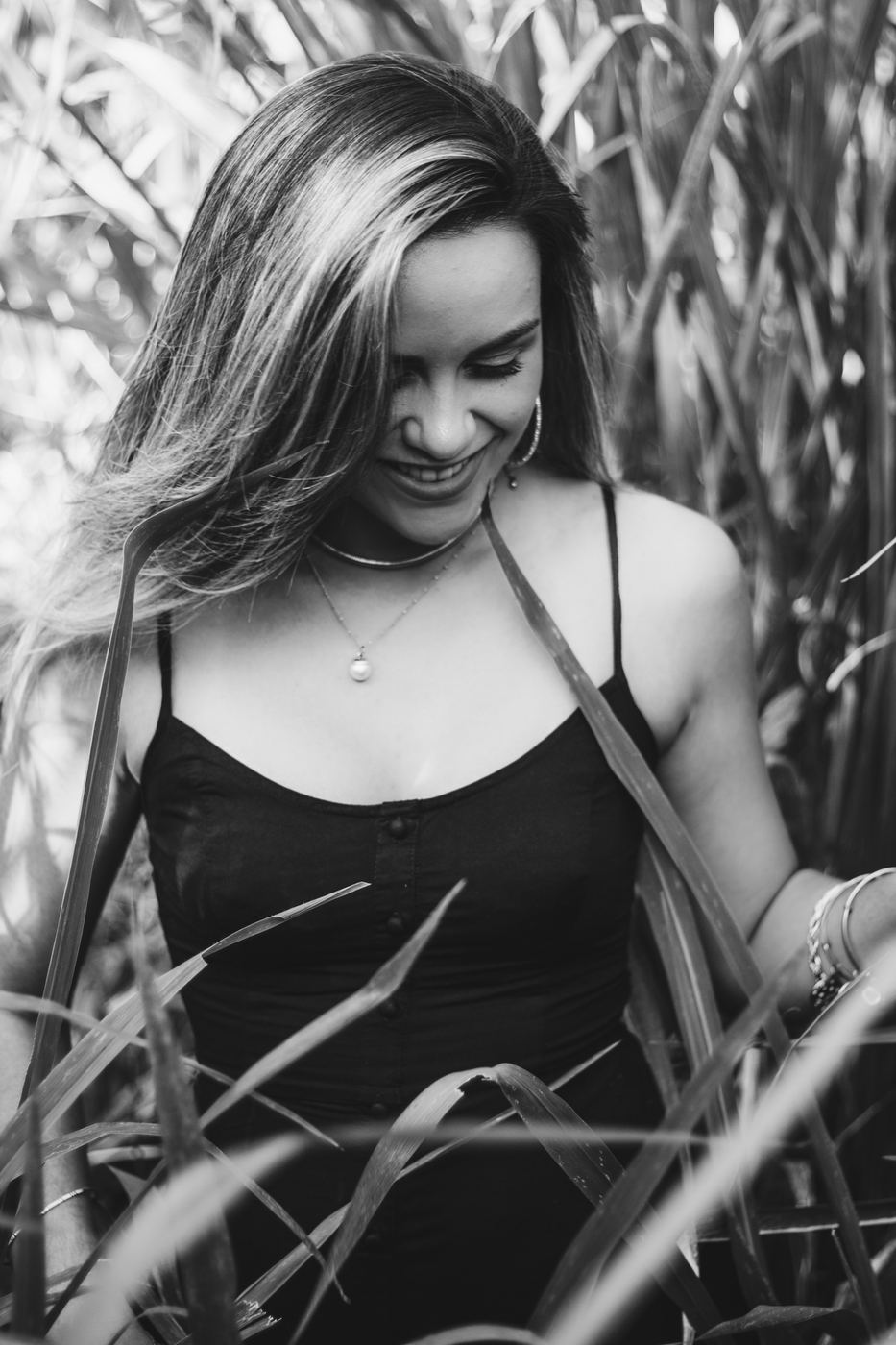 Black and white portrait in tall grass